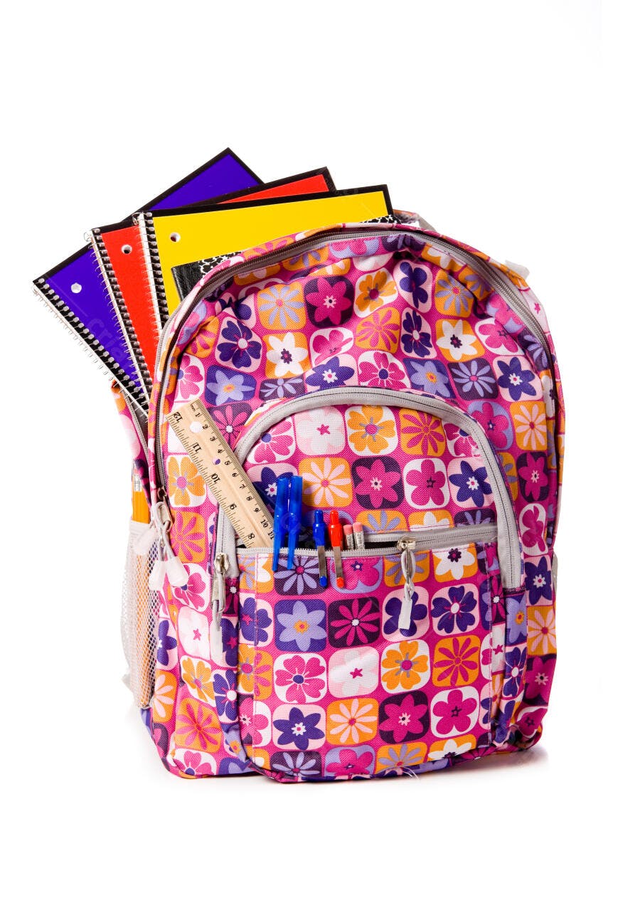 Mochila escolar rosa com cadernos e lápis