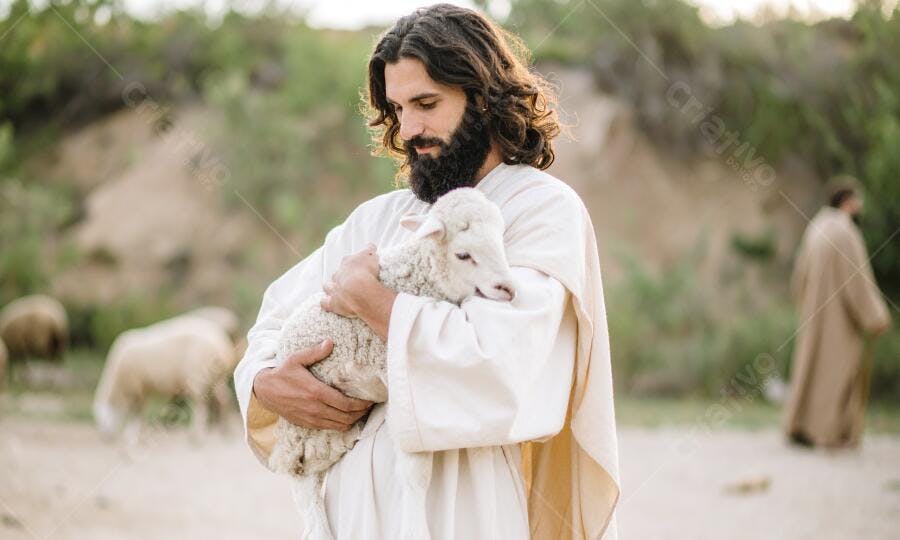 Jesus segurando um cordeiro indefeso