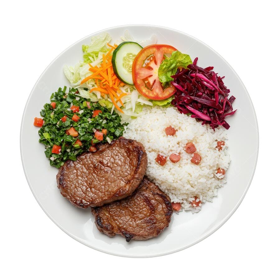Prato de carne grelhada com arroz e salada