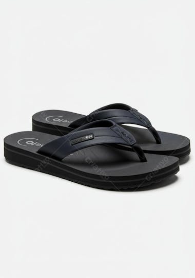 Pair of black platform flip flops. Dark navy blue details on the strap. Studio shot on white background. Sober and elegant colors. Modern and casual design.