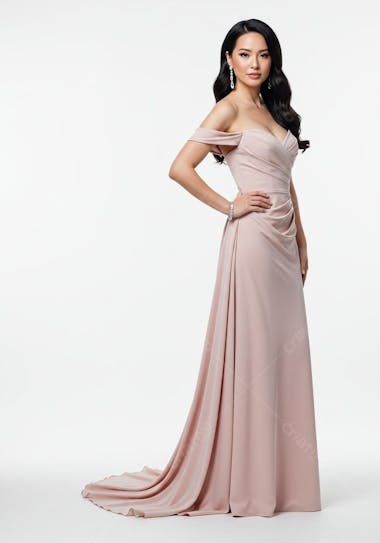 Elegant Asian woman in a flowing blush pink maxi dress against a white background. The dress features draped detailing at the waist and a sophisticated, timeless feel. The overall mood is chic and refined.