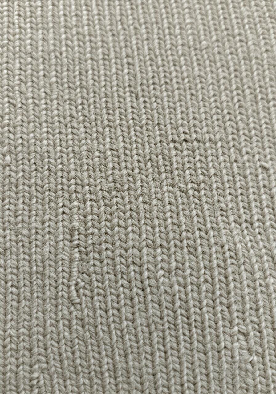Textura de tecido bege em ponto de zig-zag