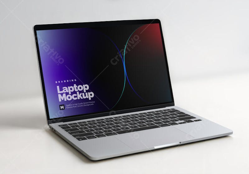 Realistic mockup of a silver notebook in a ¾ perspective, showcasing a dark gradient screen in shades of purple, blue, and red. Perfect for showcasing modern and clean branding presentations.