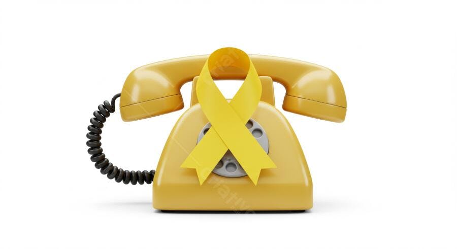 Telefone amarelo com fita amarela