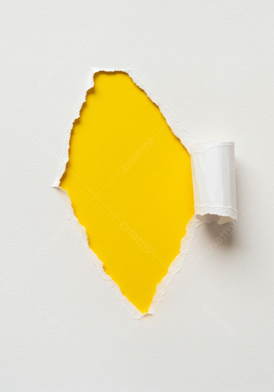 Papel rasgado revelando fundo amarelo