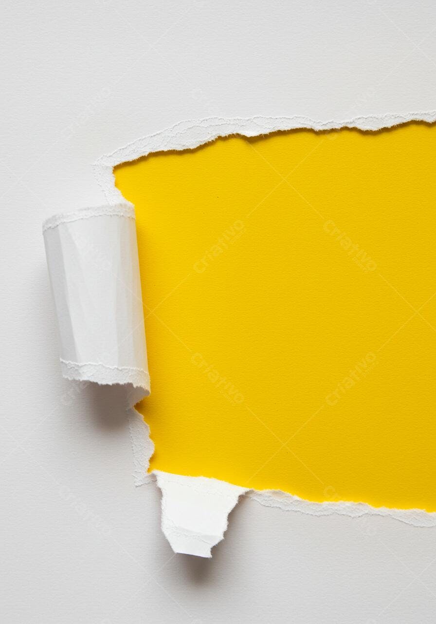 Papel rasgado revelando fundo amarelo