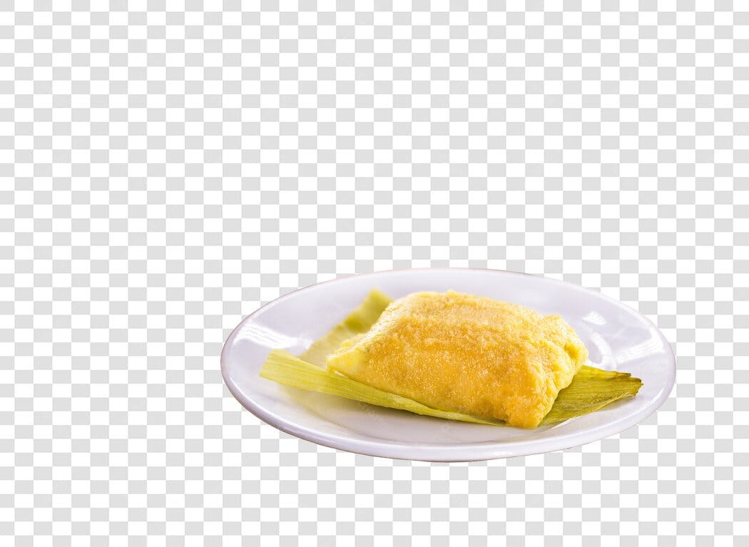 Imagem Pamonha de milho prato branco folha verde PNG com fundo transparente