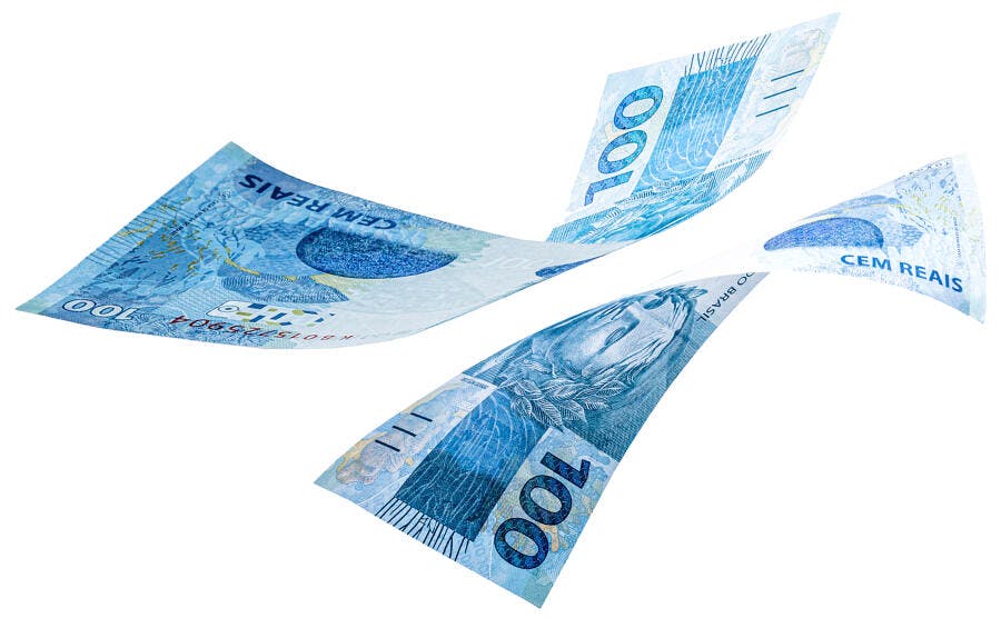 Cédulas de 100 reais flutuando dinheiro brasileiro em fundo branco