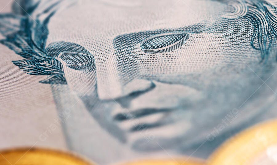Cédula de Real Brasileiro efigie azul em macro com textura de papel detalhada