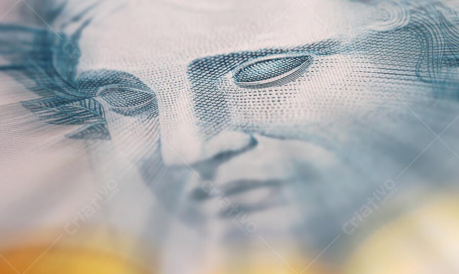 Cédula de dinheiro brasileiro efígie da república em close-up detalhe azul e branco
