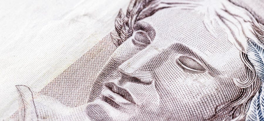 Efígie da República em nota de Real brasileiro detalhe macro cinza e branco