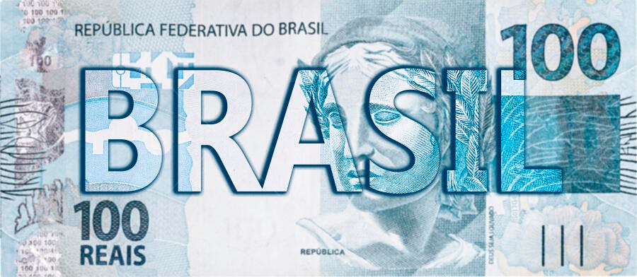 Palavra BRASIL em azul sobre nota de 100 reais dinheiro e finanças