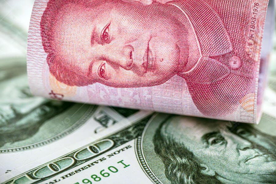 Moeda chinesa Yuan e dólares americanos closeup de finanças globais