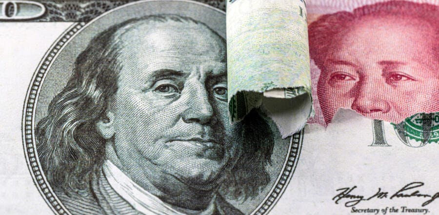 Dólar americano e yuan chinês em comparação econômica e comercial