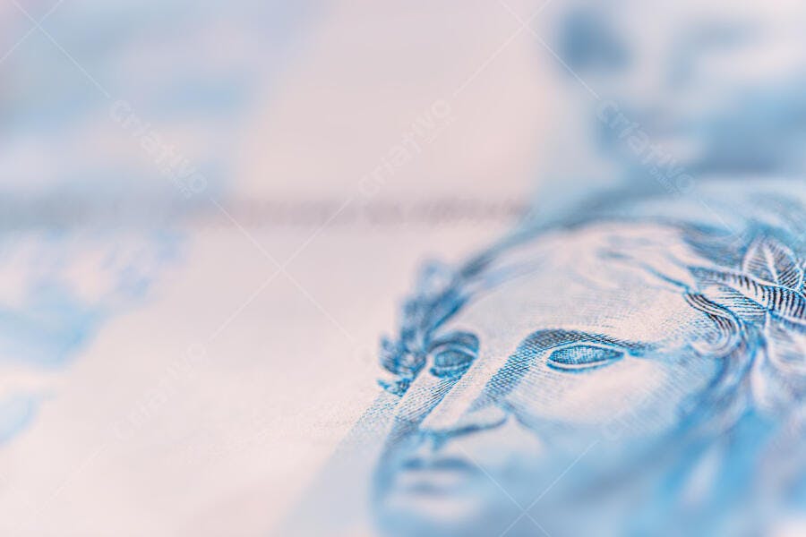 Cédula de Real azul close-up da Efígie da República mulher em dinheiro brasileiro