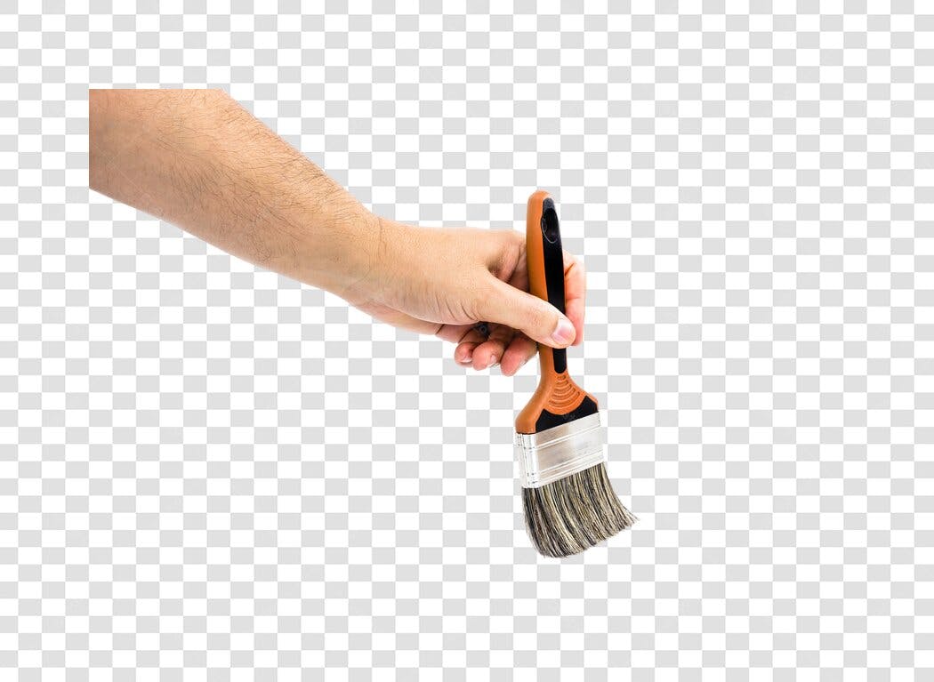 Mão de pintor segurando pincel de pintura laranja PNG com fundo transparente