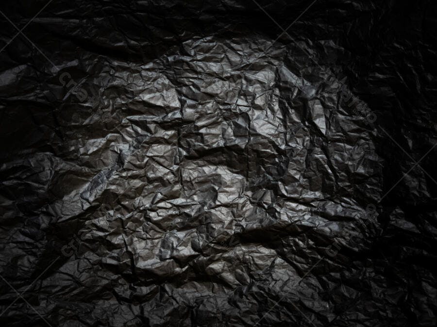 Textura plástico preto amassado detalhado para fundo