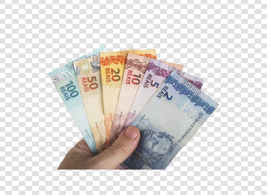 Imagem de Mão Segurando Notas de Reais Brasileiros Coloridos PNG com fundo transparente