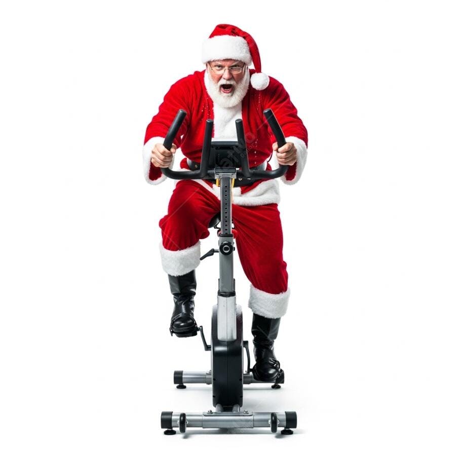 Papai Noel gritando de esforço em bicicleta ergométrica natalina