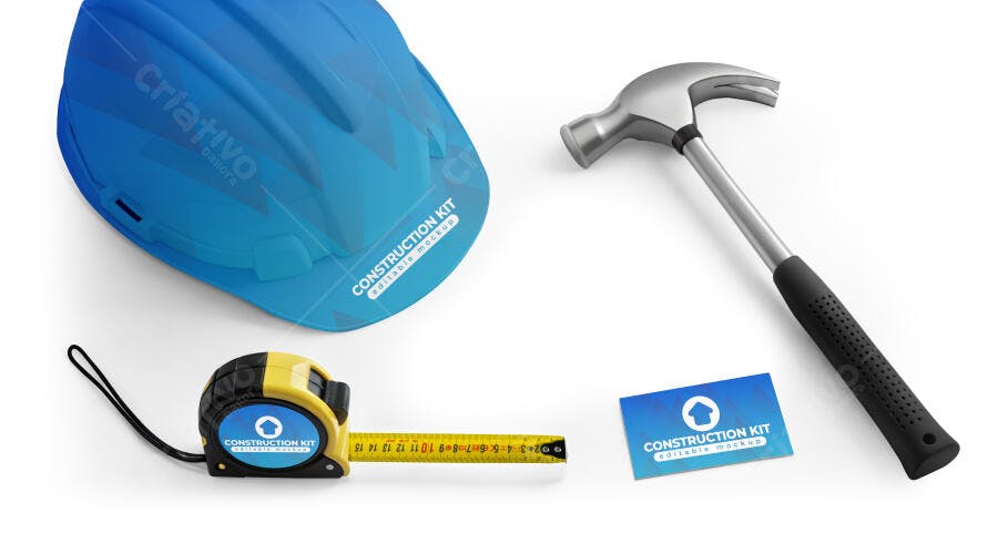 Mockup Kit de Construção Profissional Capacete Azul Martelo Trena e Cartão Visita