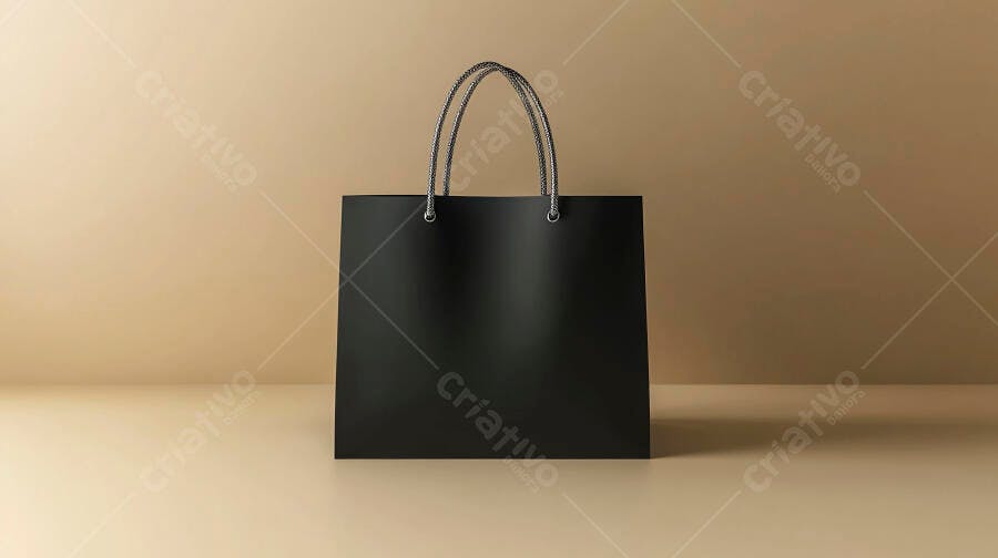 Sacola de compras preta com alças cinzas em estúdio fundo bege