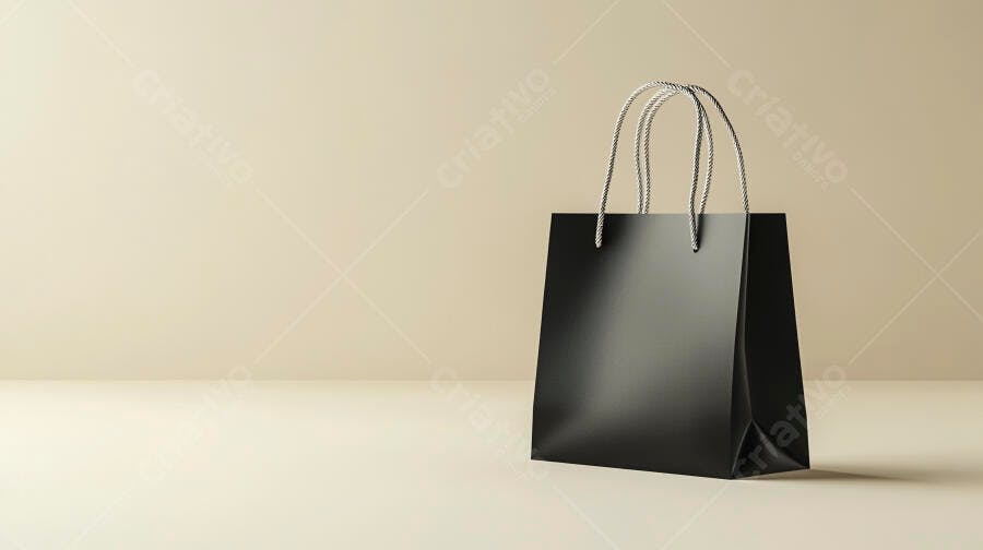 Sacola de compras preta com alças brancas em estúdio minimalista sobre fundo bege
