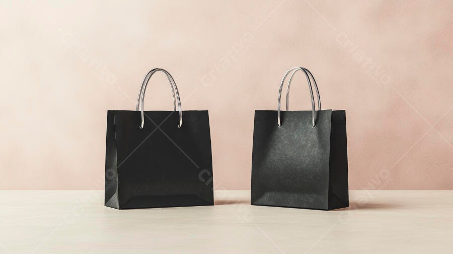Duas sacolas de compras pretas sobre mesa bege com fundo rosa claro