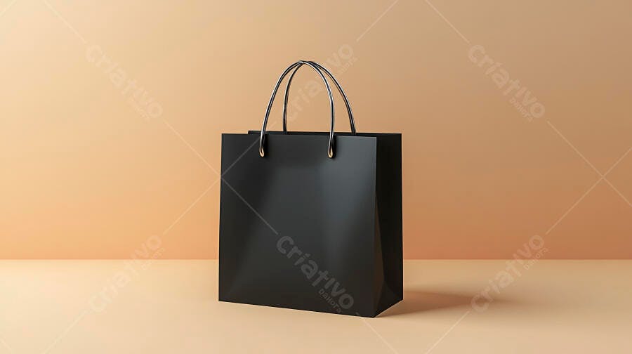 Sacola de compras preta com alças metálicas douradas em fundo bege e pêssego