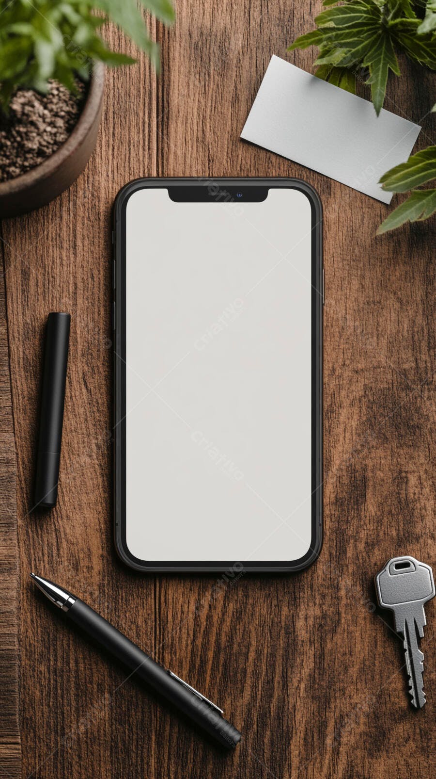 Smartphone mockup com tela branca em mesa de madeira e objetos de escritório