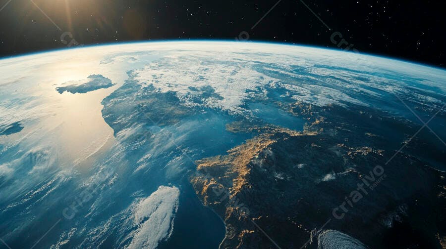 Planeta Terra visto do espaço com sol nascendo sobre continentes e oceanos azuis