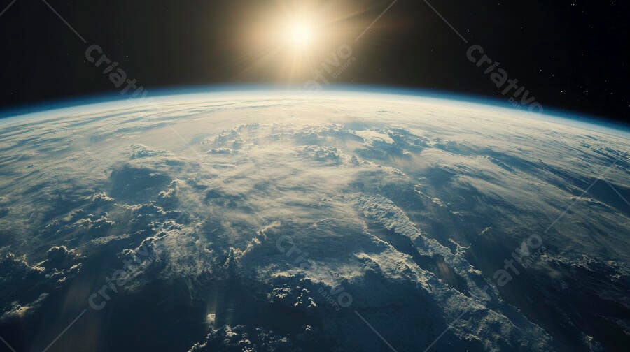 Planeta Terra visto do espaço com nuvens e horizonte iluminado pelo sol