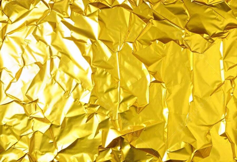 Foto Textura Amassada Papel Alumínio Dourado Brilhante