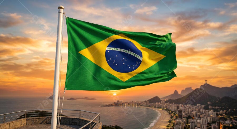 Foto Bandeira do Brasil Cristo Redentor Pôr do Sol Rio de Janeiro